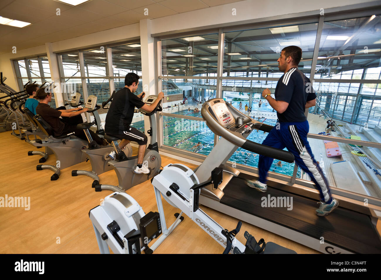 Weights and cardio training room of the Vichy - Val d'Allier swimming pool. Salle de musculation et de cardio-training. Stock Photo