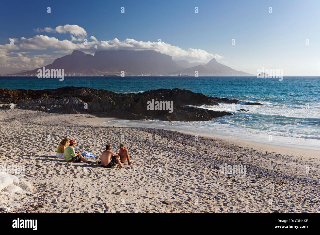 South Africa, Cape Town, Blouberg beach. People relaxing. Background: Table mountain. Stock Photo