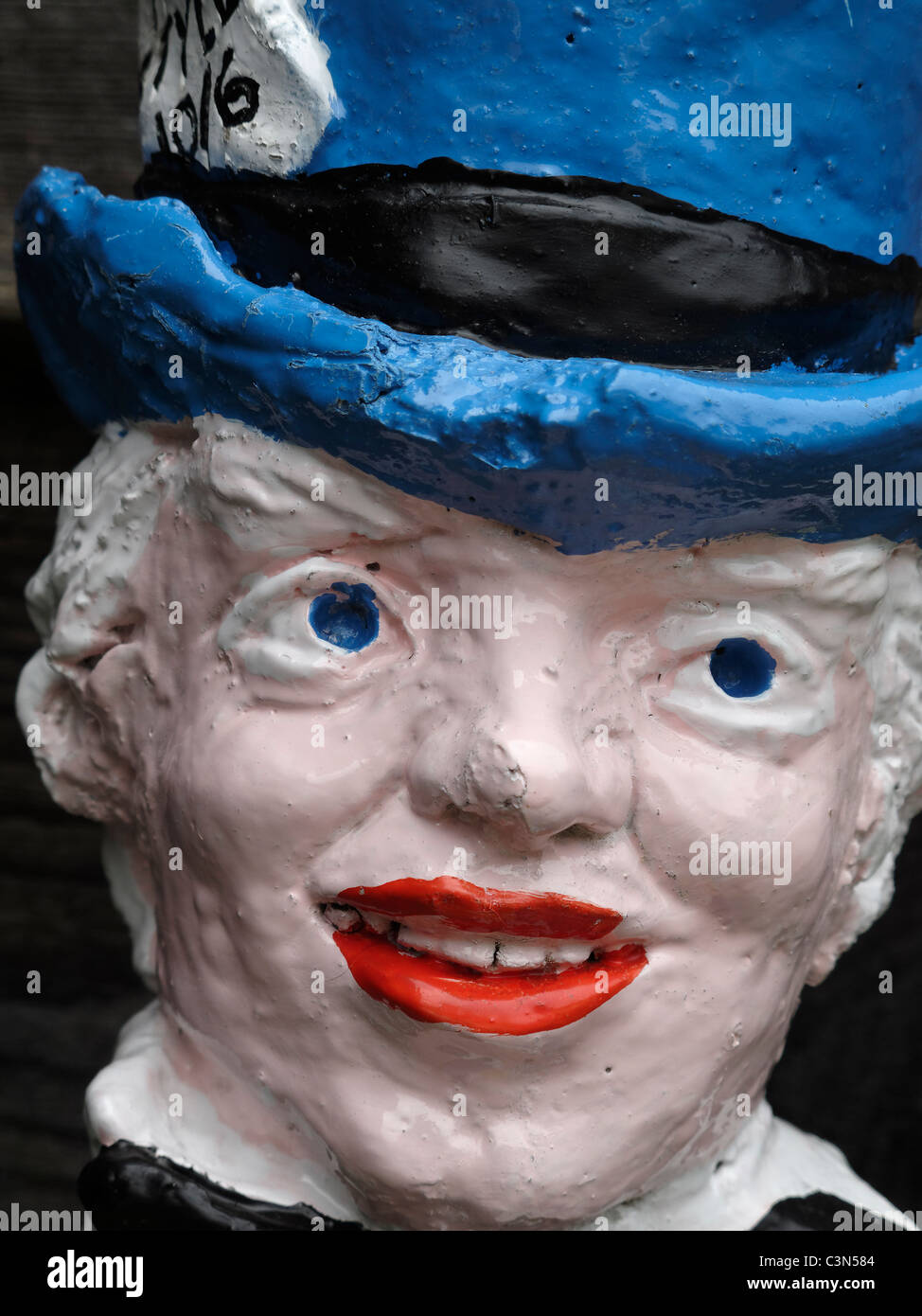 A garden ornament depicting the Mad Hatter at the Old Smithy, Godshill, Isle of Wight, England. Stock Photo