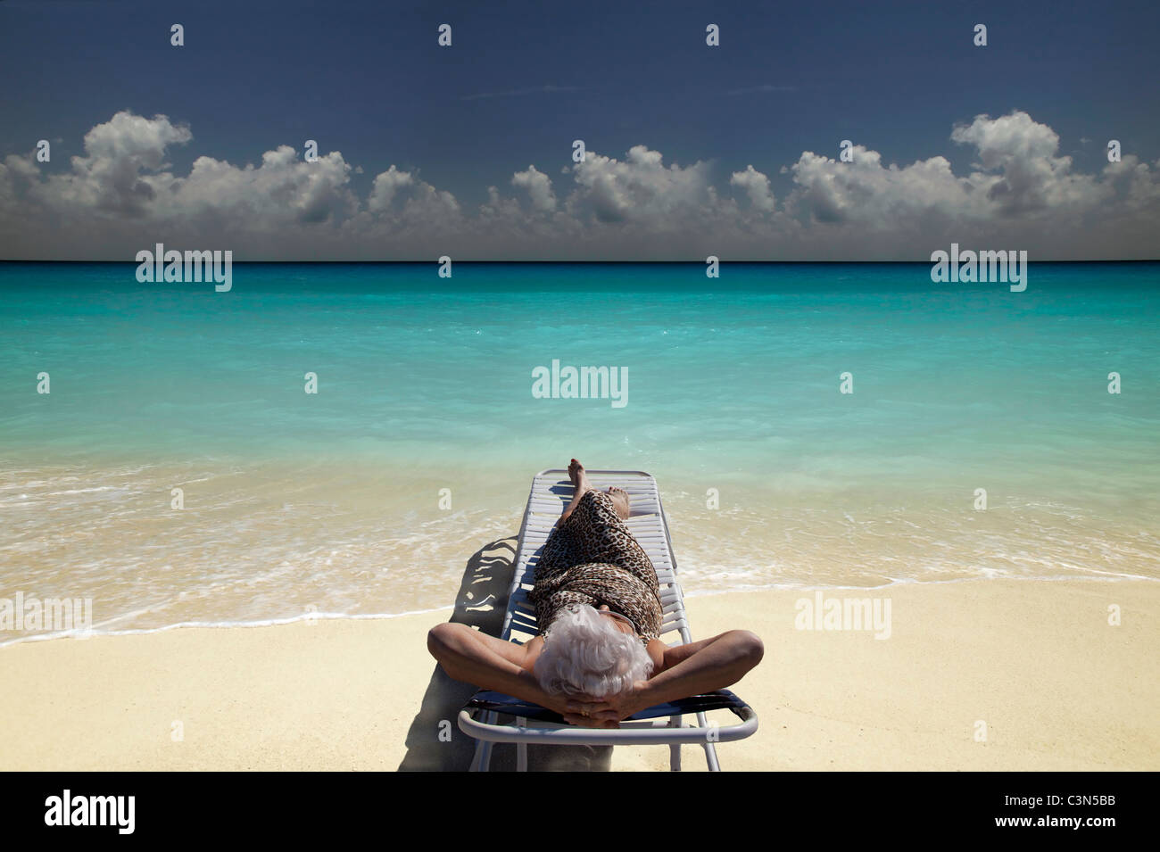 Senior Woman on the beach Stock Photo