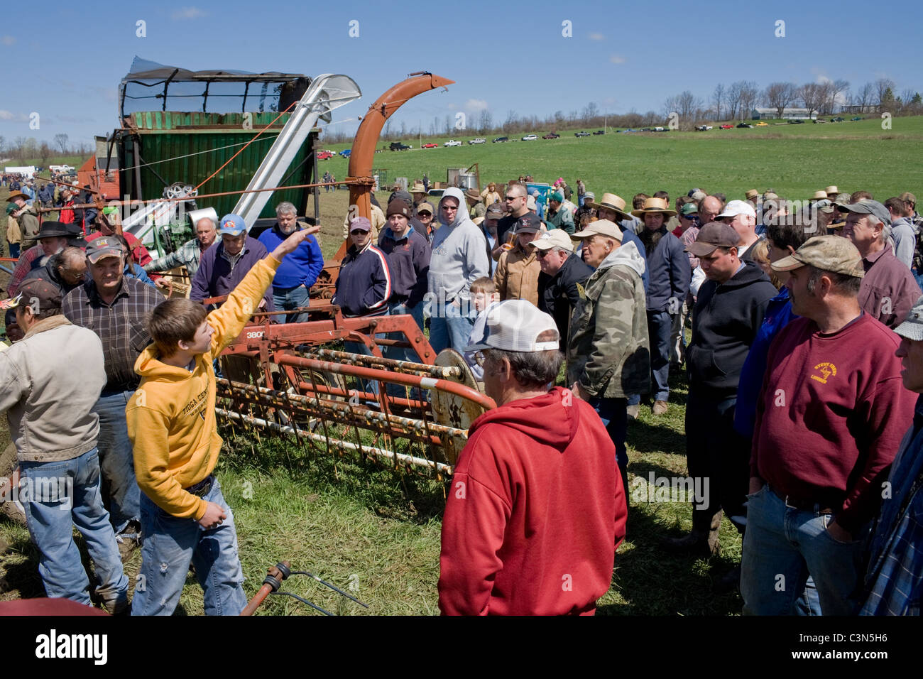 Young teen handles auction of farm equipment in Mohawk valley of central New York State Stock Photo
