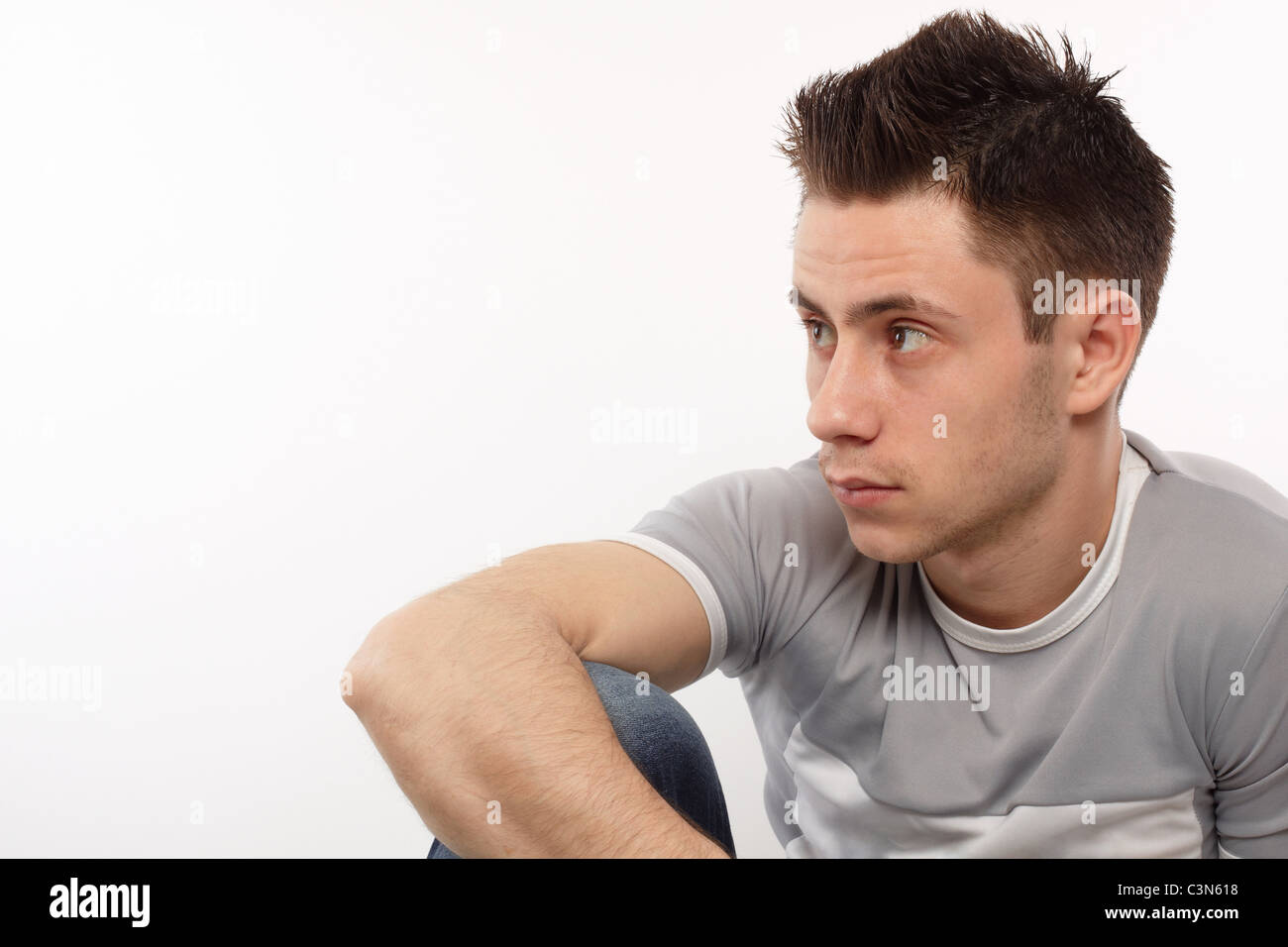 Young sportsman looking on his right side Stock Photo