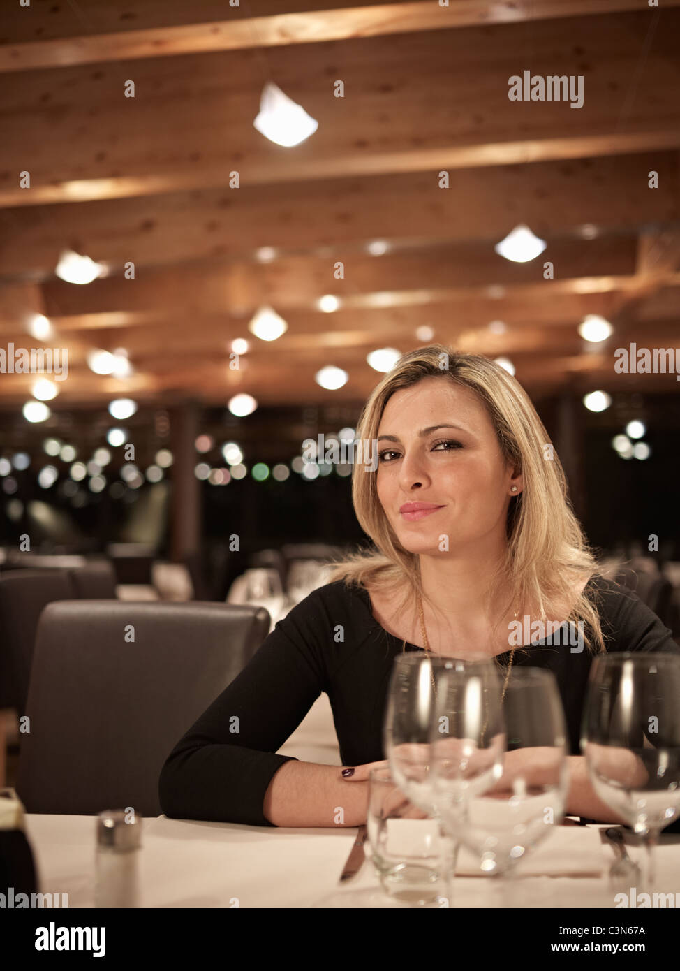 Female Business woman in restaurant Stock Photo