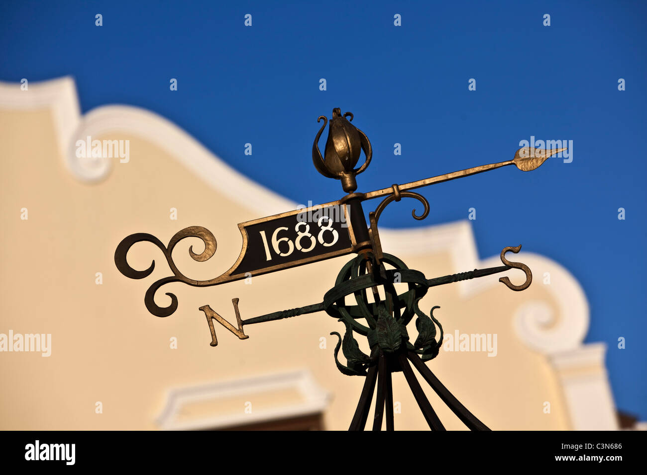 South Africa, Western Cape, Franschhoek, Wind vane in front of Cape Dutch house. Stock Photo