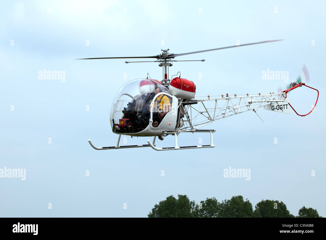 Agusta Bell 47-4A G-GGTT in flight at Breighton Airfield Stock Photo