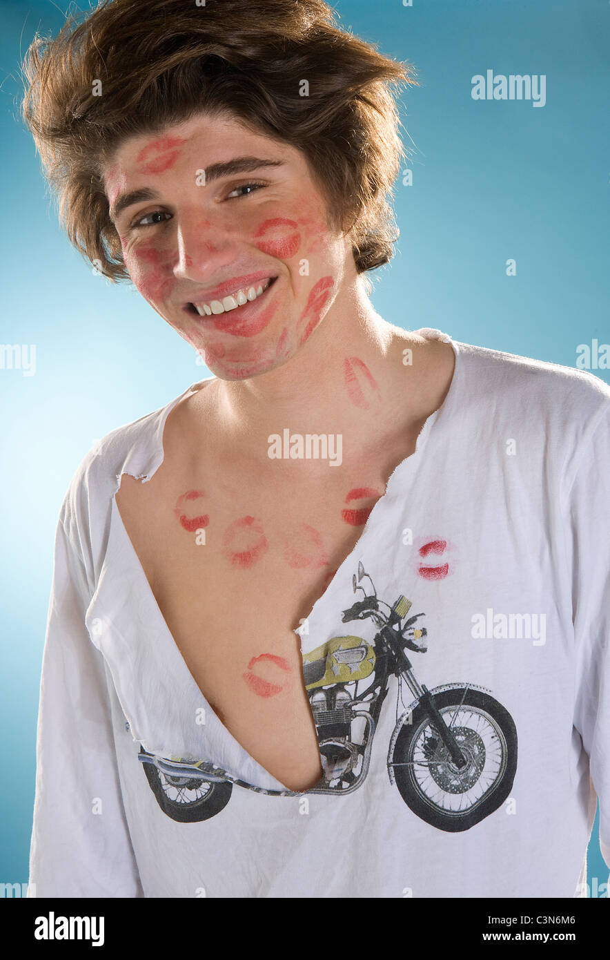 Young cute man many kisses Stock Photo