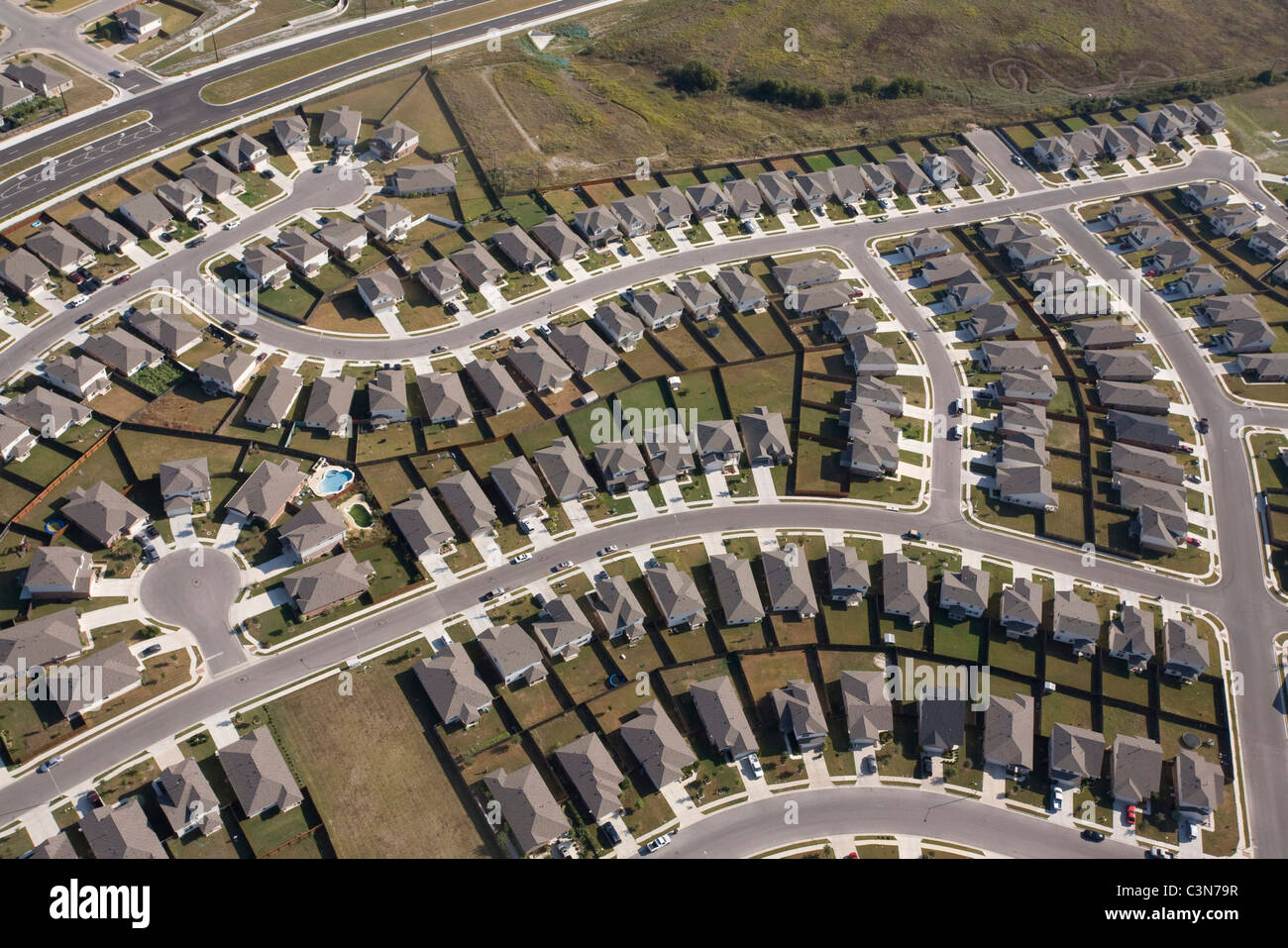 Aerials of suburban growth in Central Texas of Travis County and northern Hays County. Stock Photo