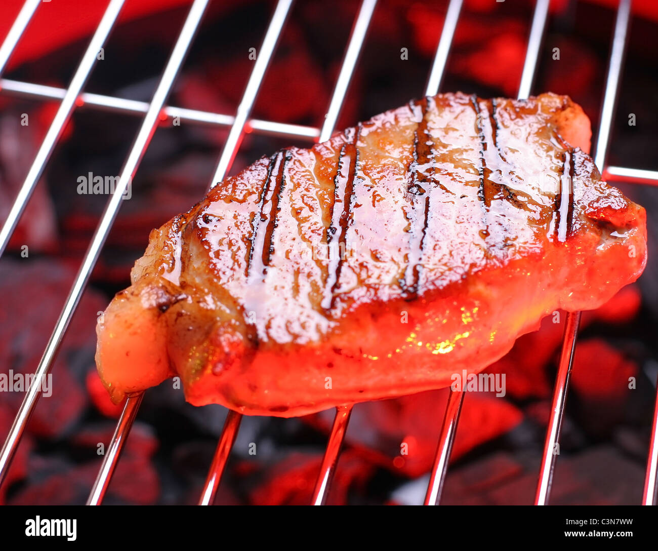 Hot beefsteak on barbecue Stock Photo Alamy