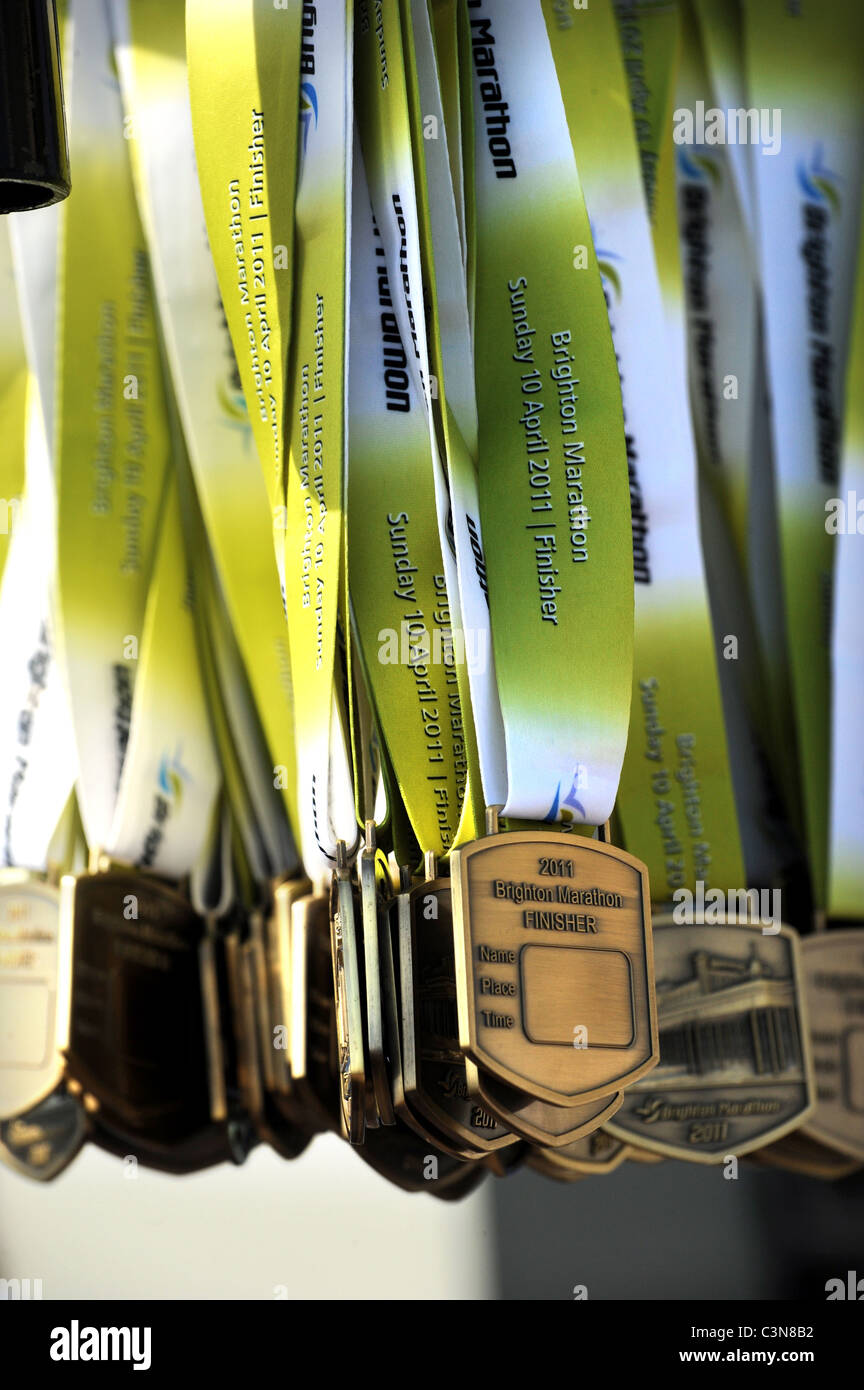 Brighton Marathon 2011 - medals for the runners at the finish line Stock Photo