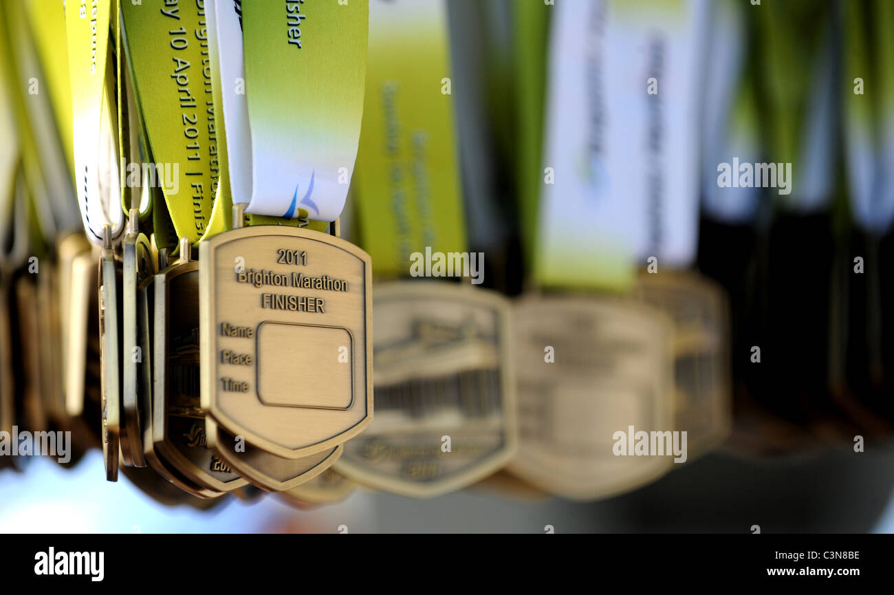 Brighton Marathon 2011 - medals for the runners at the finish line Stock Photo