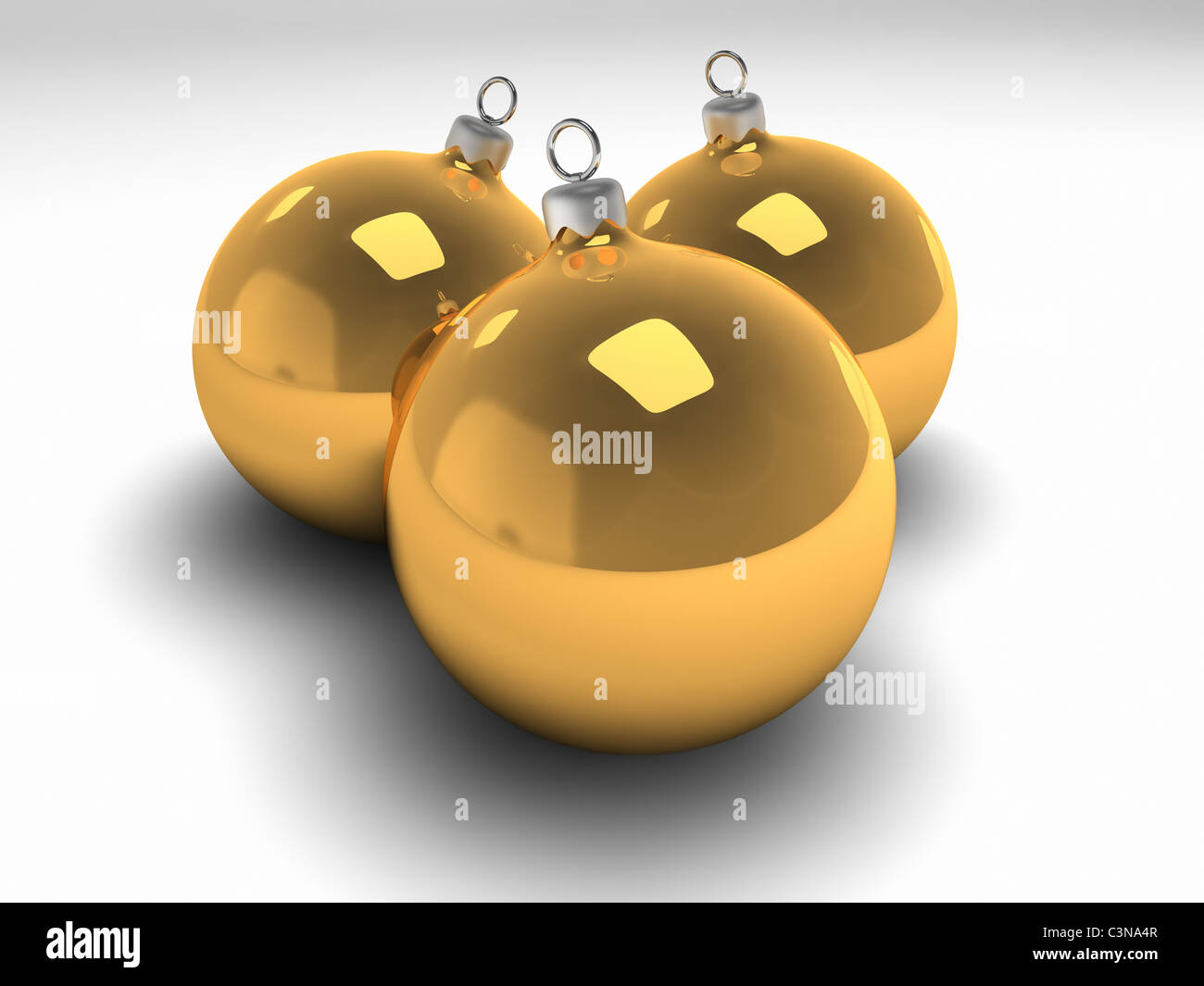 Three gold christmas bulbs with silver hangers, 3d render Stock Photo