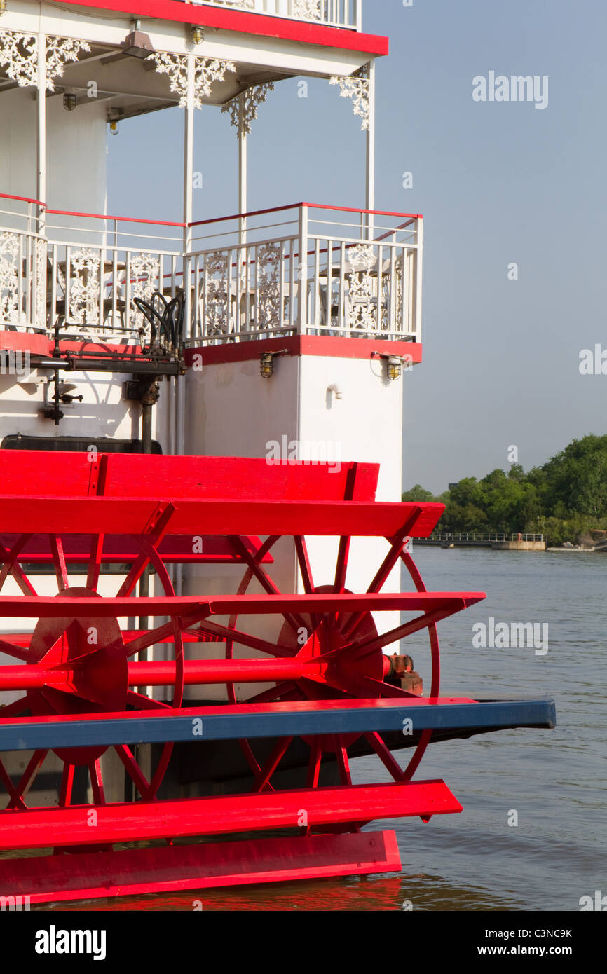 Red paddle propulsion wheeler of an old style river steamboat. Stock Photo