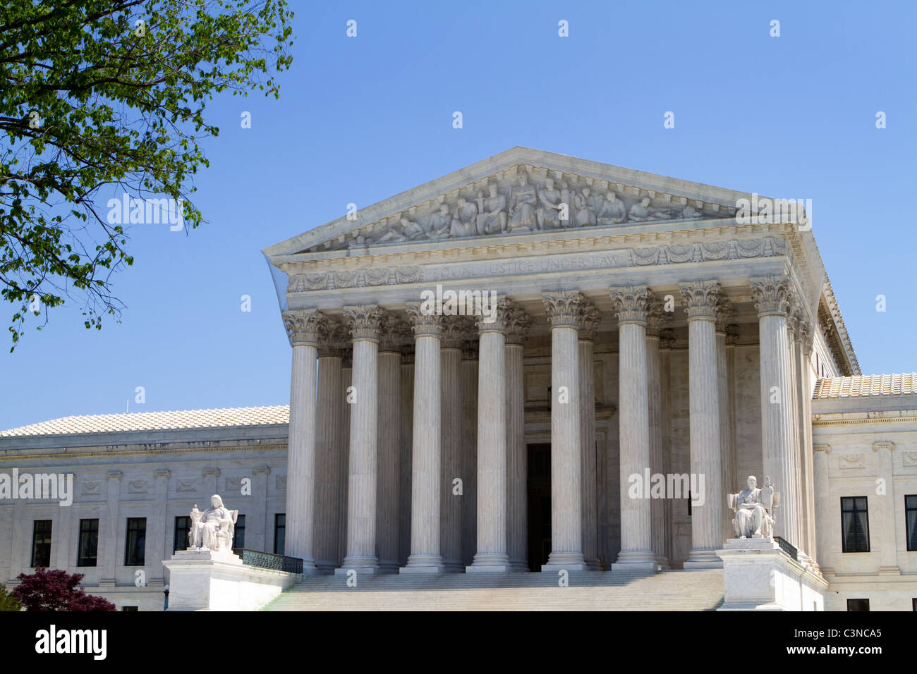 USA Supreme Court building in Washington, D.C. against a blue sky background. Stock Photo