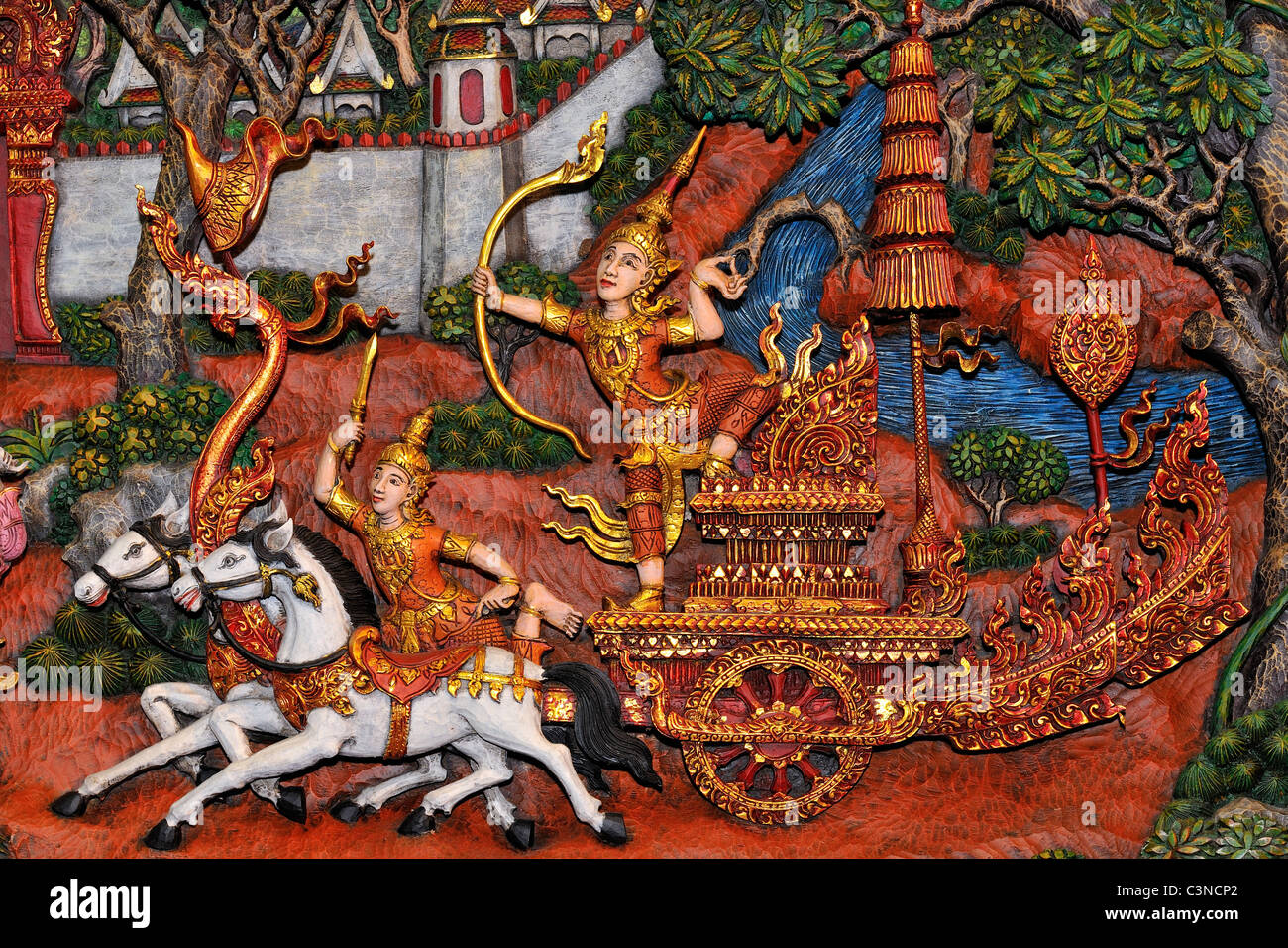 Woodcarving made in Thailand, showing an epic from the Ramakien, the Thai version of the Ramayana story. Stock Photo