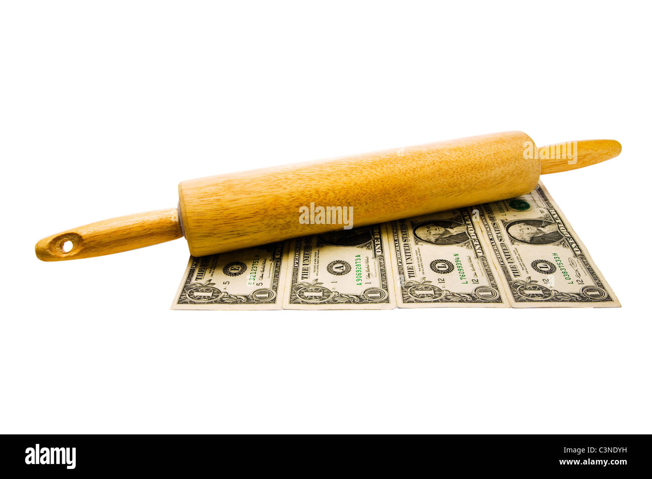 Rolling pin on us paper currency isolated over white Stock Photo