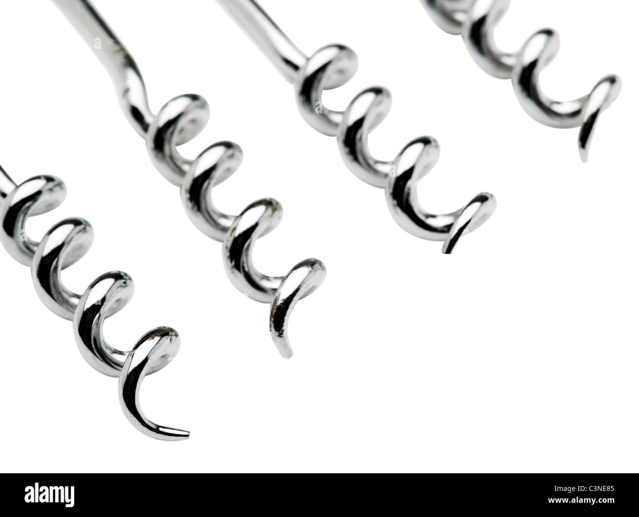 Shiny corkscrews in an order isolated over white Stock Photo Alamy