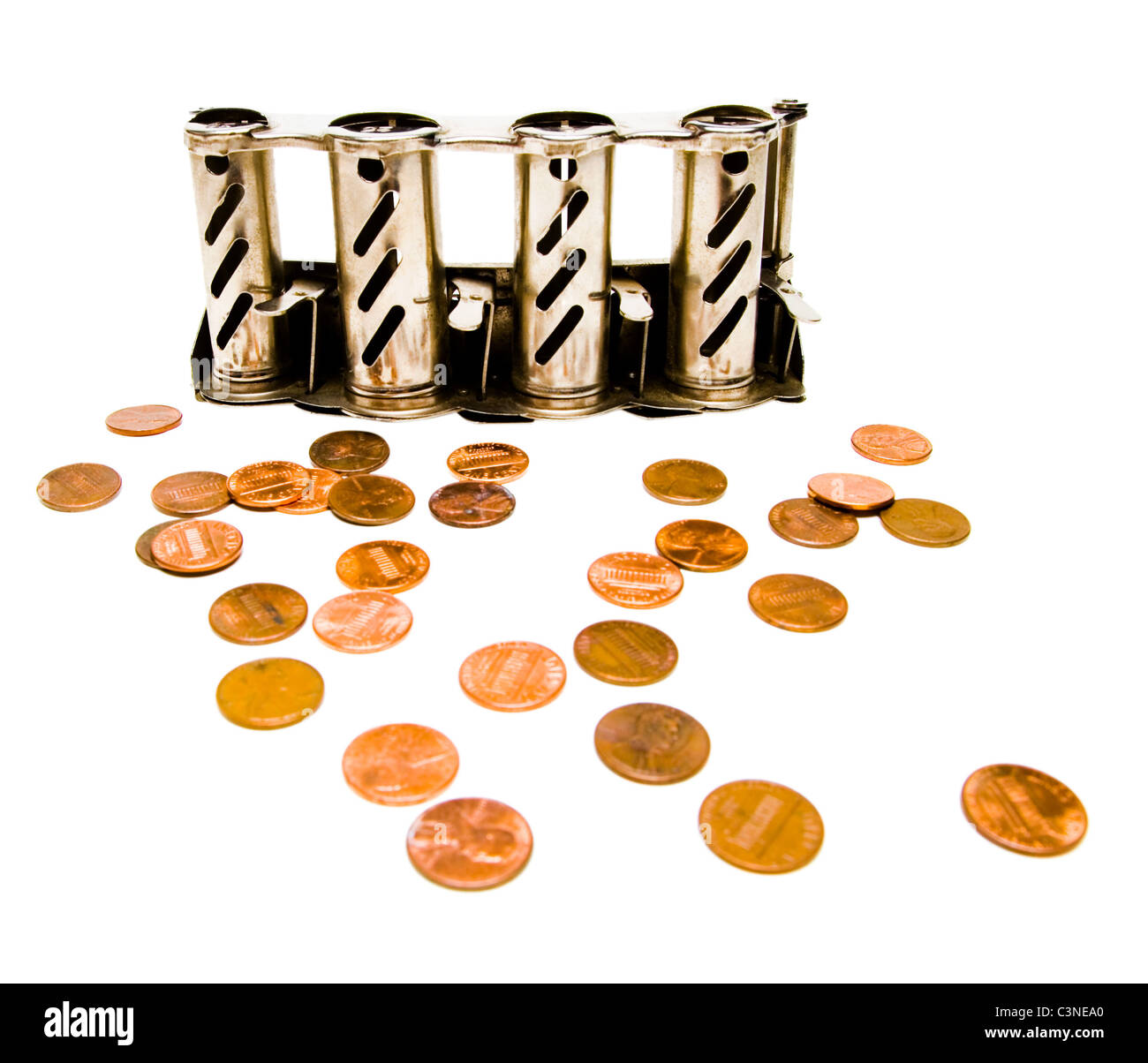 Money change dispenser near coins isolated over white Stock Photo Alamy