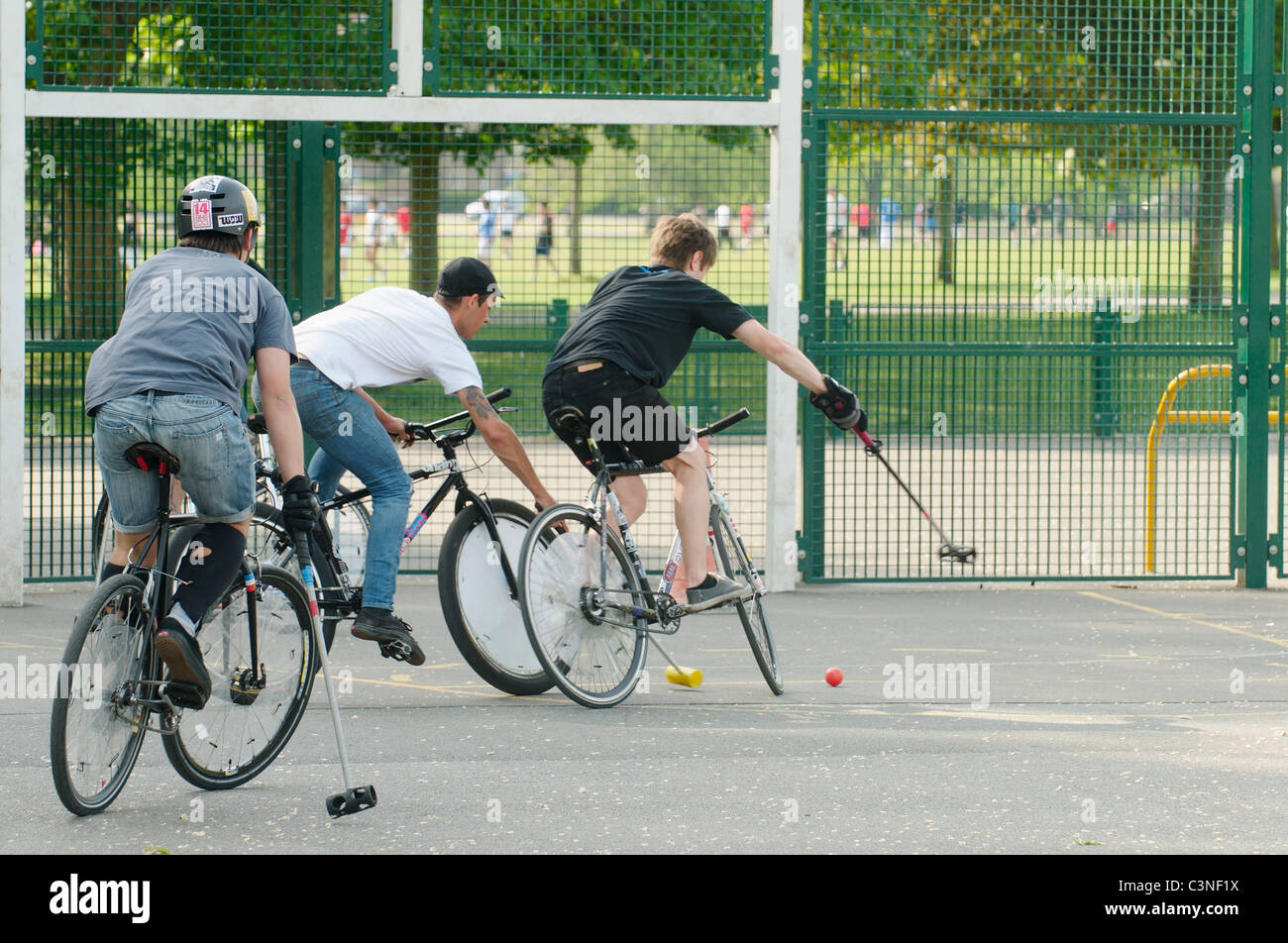 Bicycle Polo in a park in Brighton, England Stock Photo