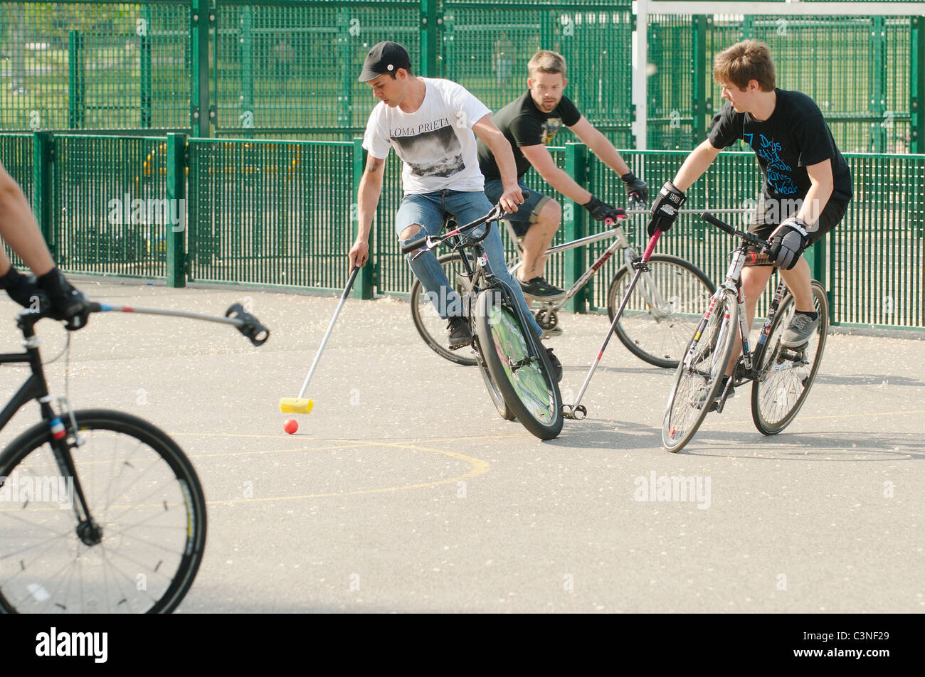 Bicycle Polo in a park in Brighton, England Stock Photo