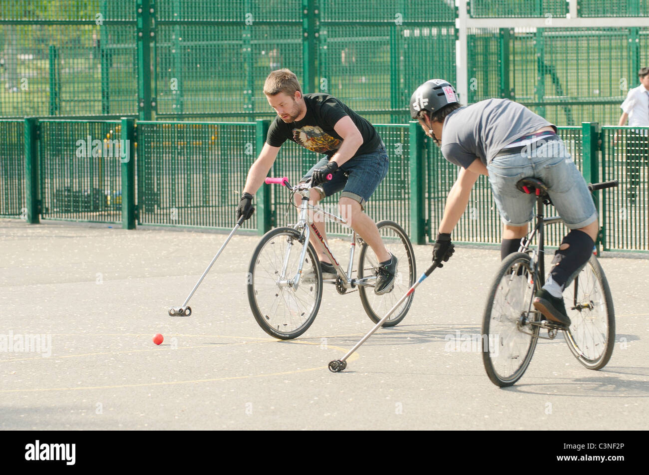 Bicycle Polo in a park in Brighton, England Stock Photo