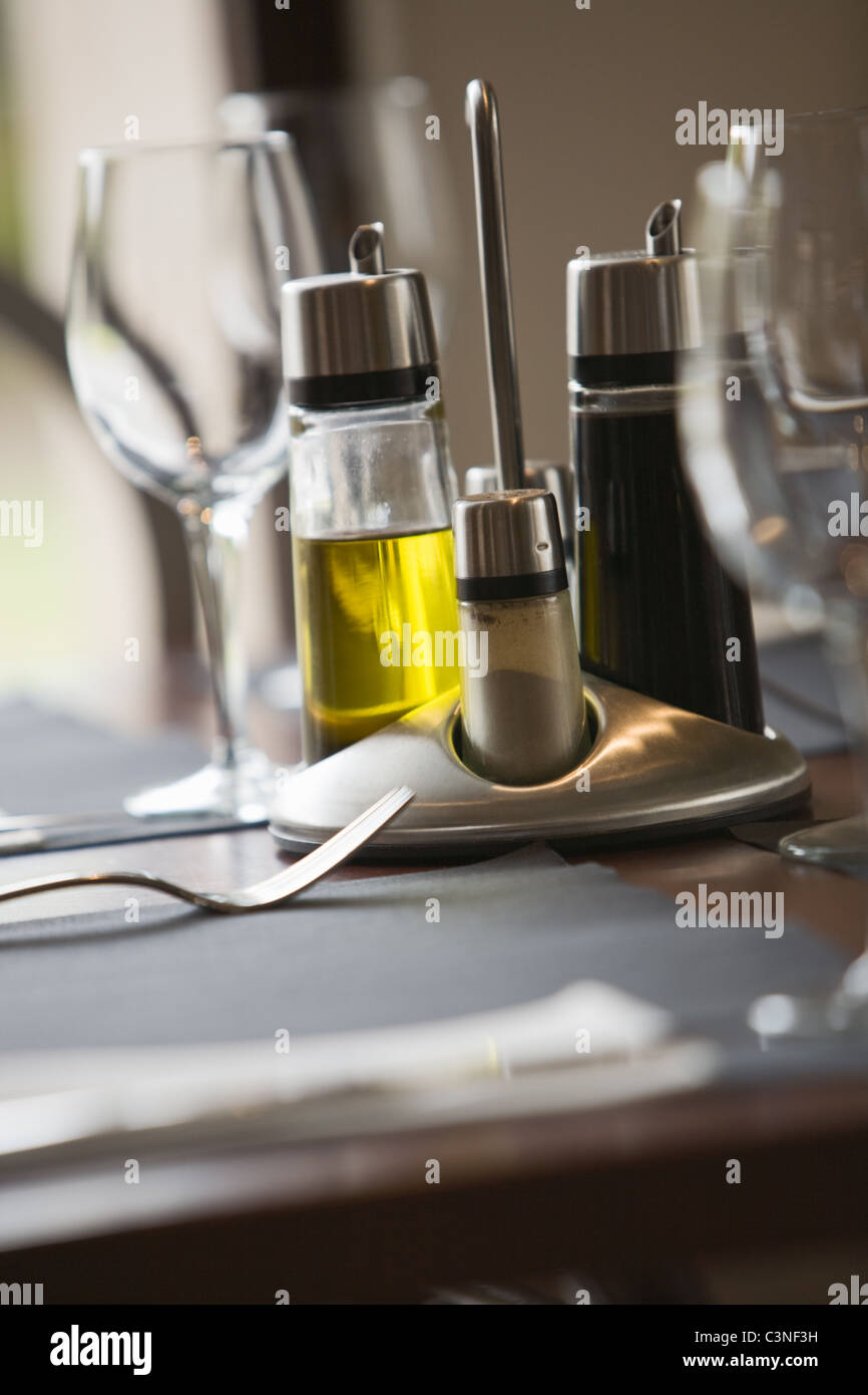 Restaurant dining table, set and ready Stock Photo - Alamy