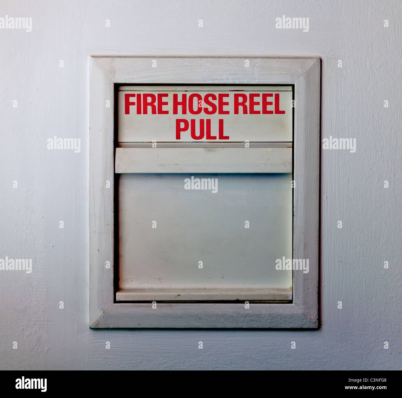 Fire hose reel Stock Photo
