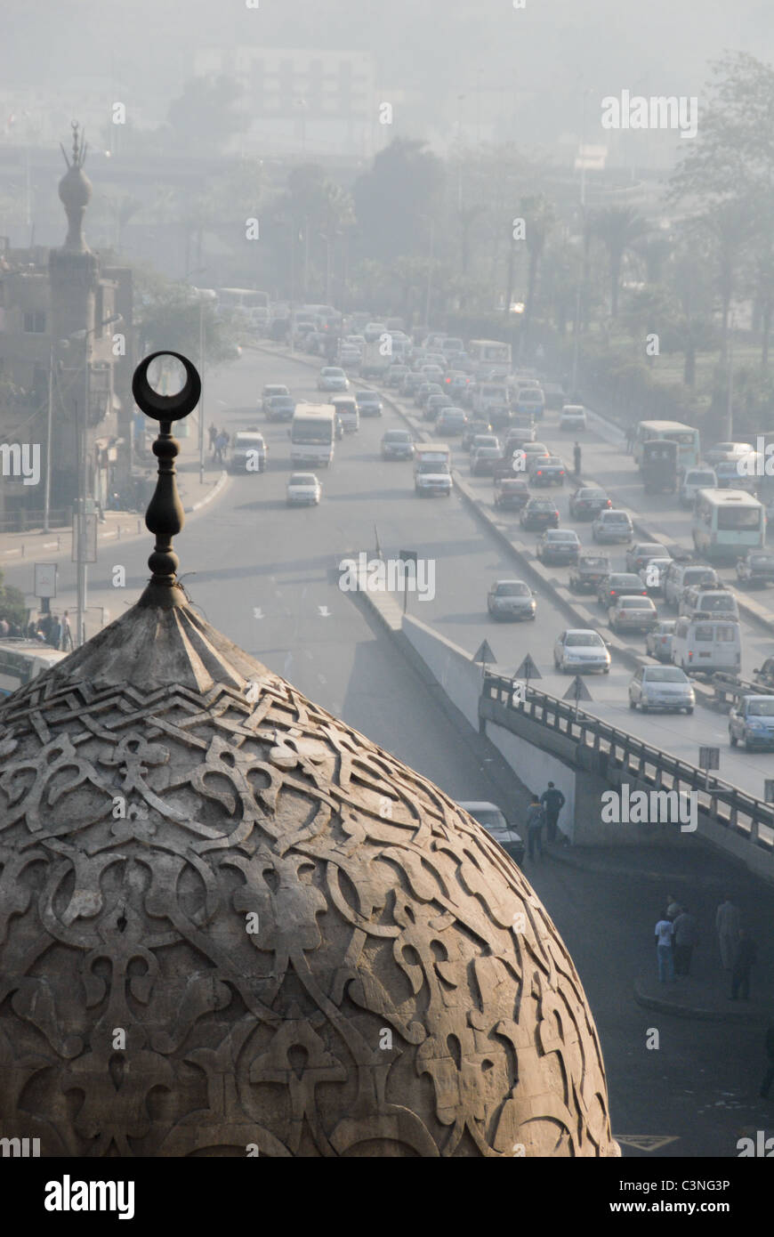 Cairo, Egypt -- The domes, minarets and traffic congestion of Cairo near the Sayeda Aisha bridge. Stock Photo