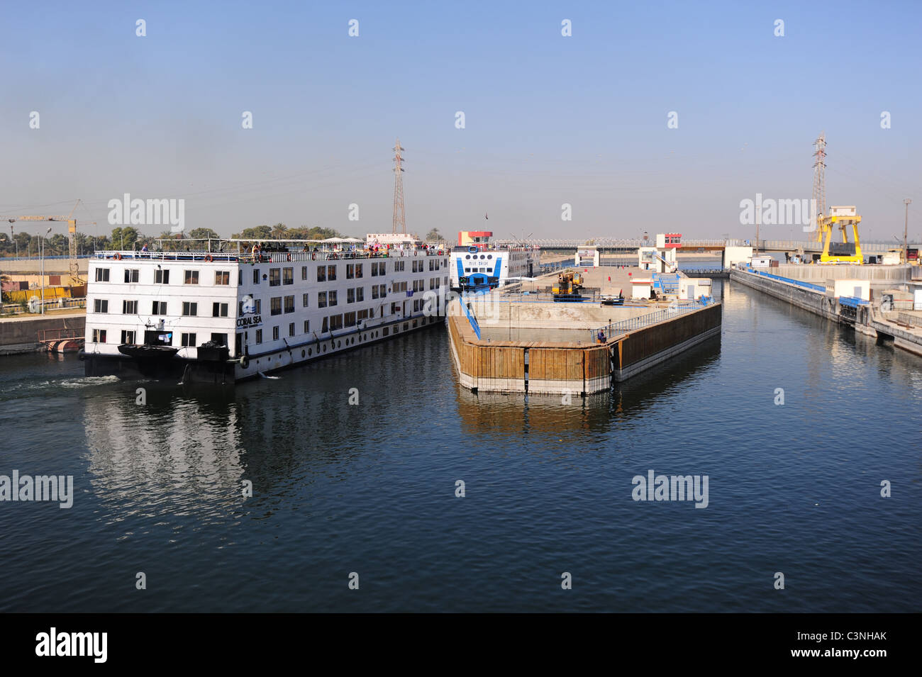 Africa Middle East Egypt Egyptian ship going through the Aswan Dam locks on the Nile River Stock Photo