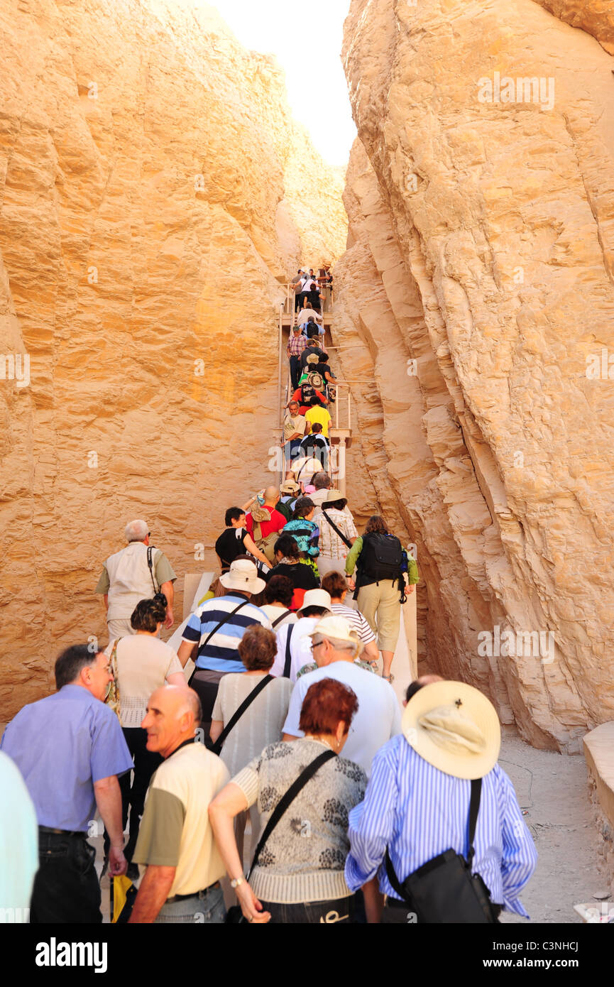 Africa Middle East Egypt Egyptian Valley of the Kings tomb entrance  Tourists line up to enter a tomb Stock Photo
