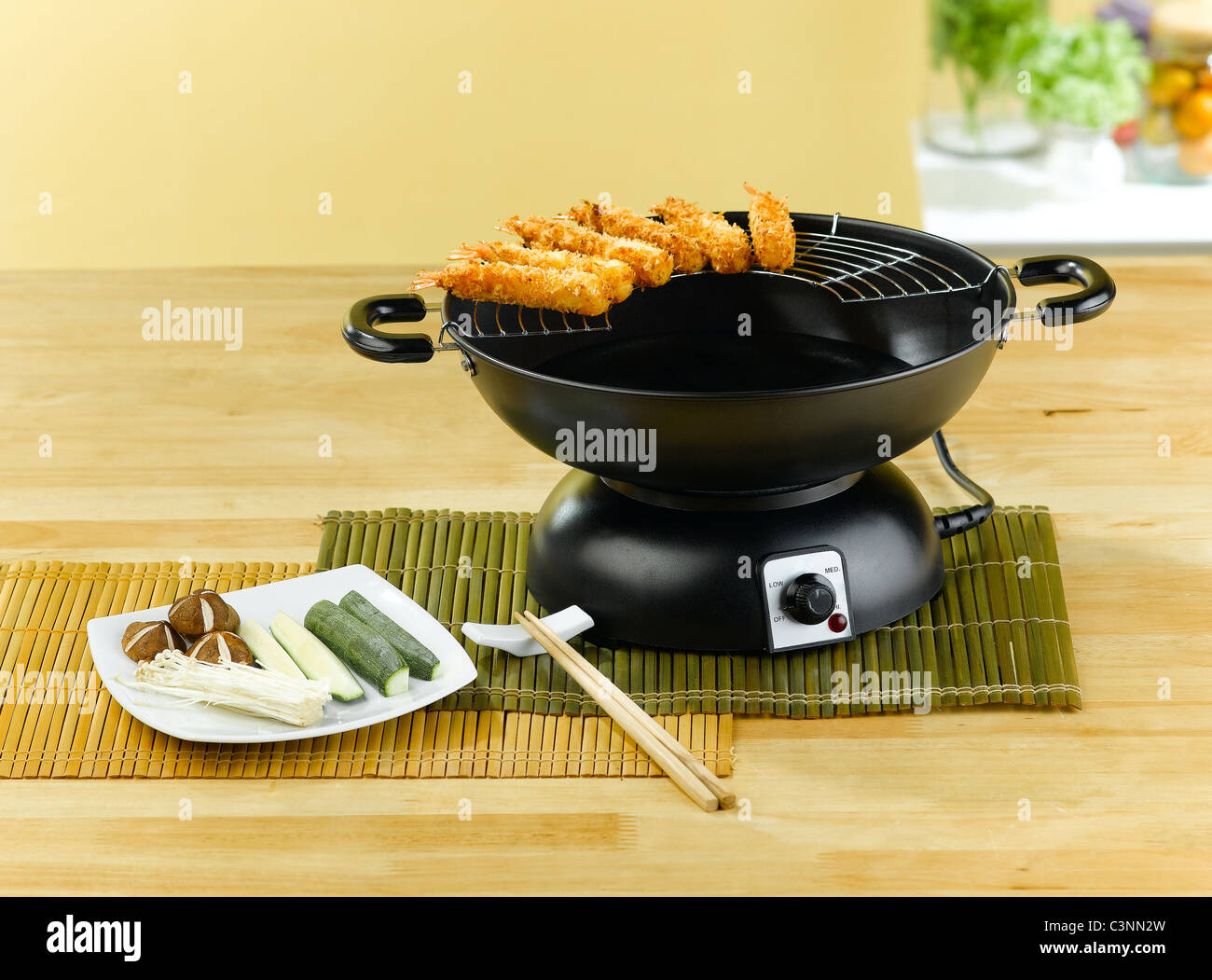 Electric frying pan and tempura Stock Photo