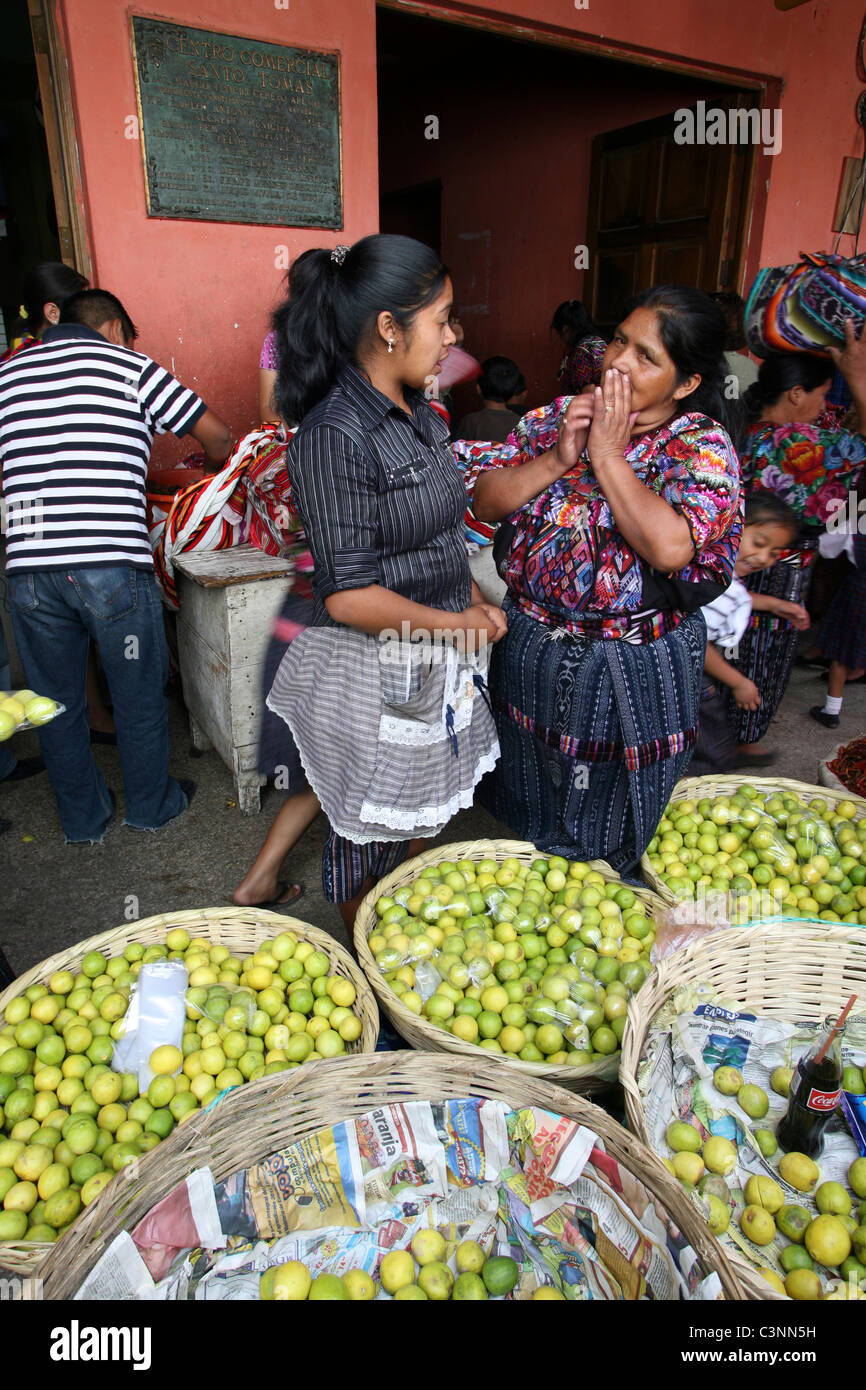 Vendors talk in the central market Stock Photo