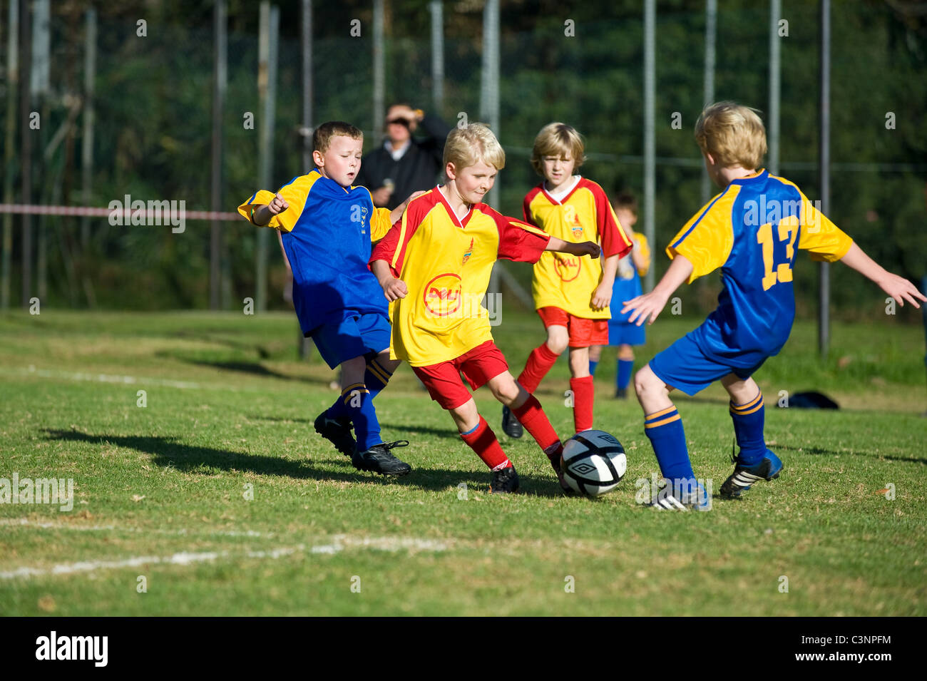 Young football players of an U9 team dribbling Cape Town South Africa Stock Photo