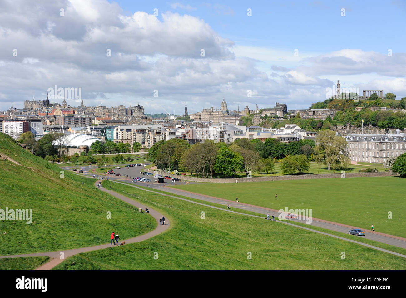 A view of the Edinburgh skyline taken from Holyrood Park. with the Castle at the left and the Palace of Holyroodhouse at right Stock Photo