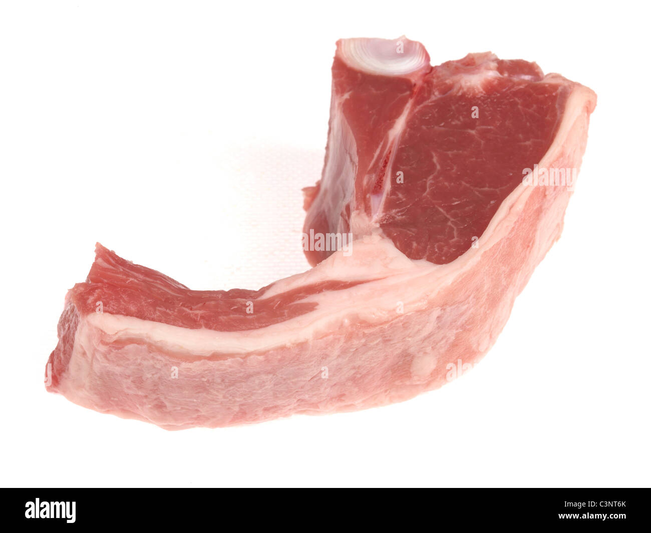 Fresh Uncooked Single Lamb Chop Against a White Background With No People And Copy Space Stock Photo