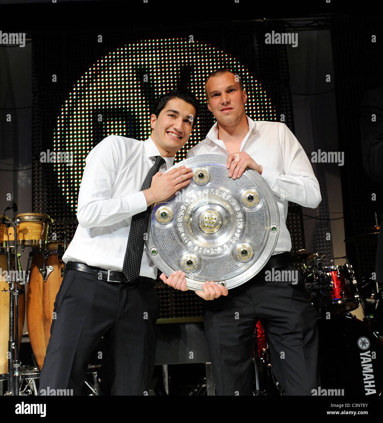 players of german football club Borussia Dortmund, Nuri Sahin (left) and Kevin Grosskreutz with championship trophy Stock Photo