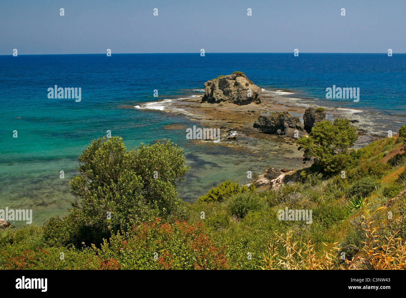 The wild, rugged and empty coastline between Latsi and the Baths of Aphrodite on the west coast of the Akamas Peninsula Stock Photo