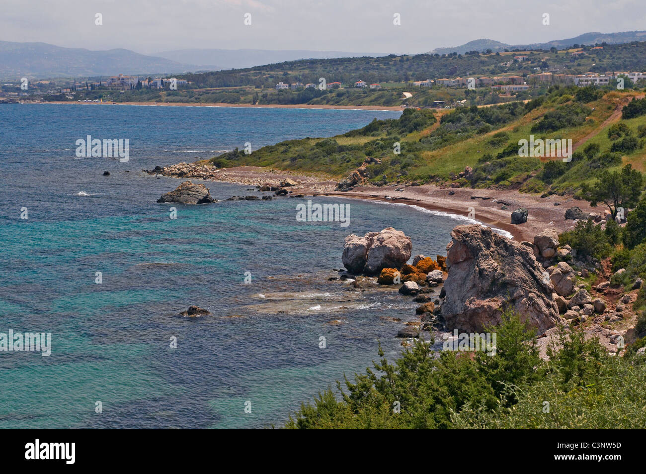 The wild, rugged and empty coastline between Latsi and the Baths of Aphrodite on the west coast of the Akamas Peninsula Stock Photo