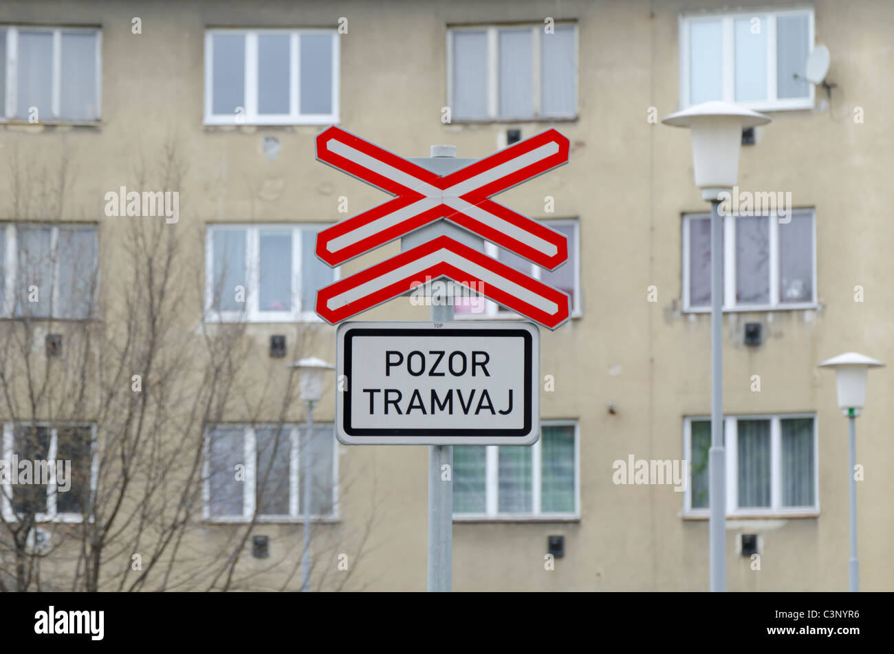 Warning sign by tram line Stock Photo
