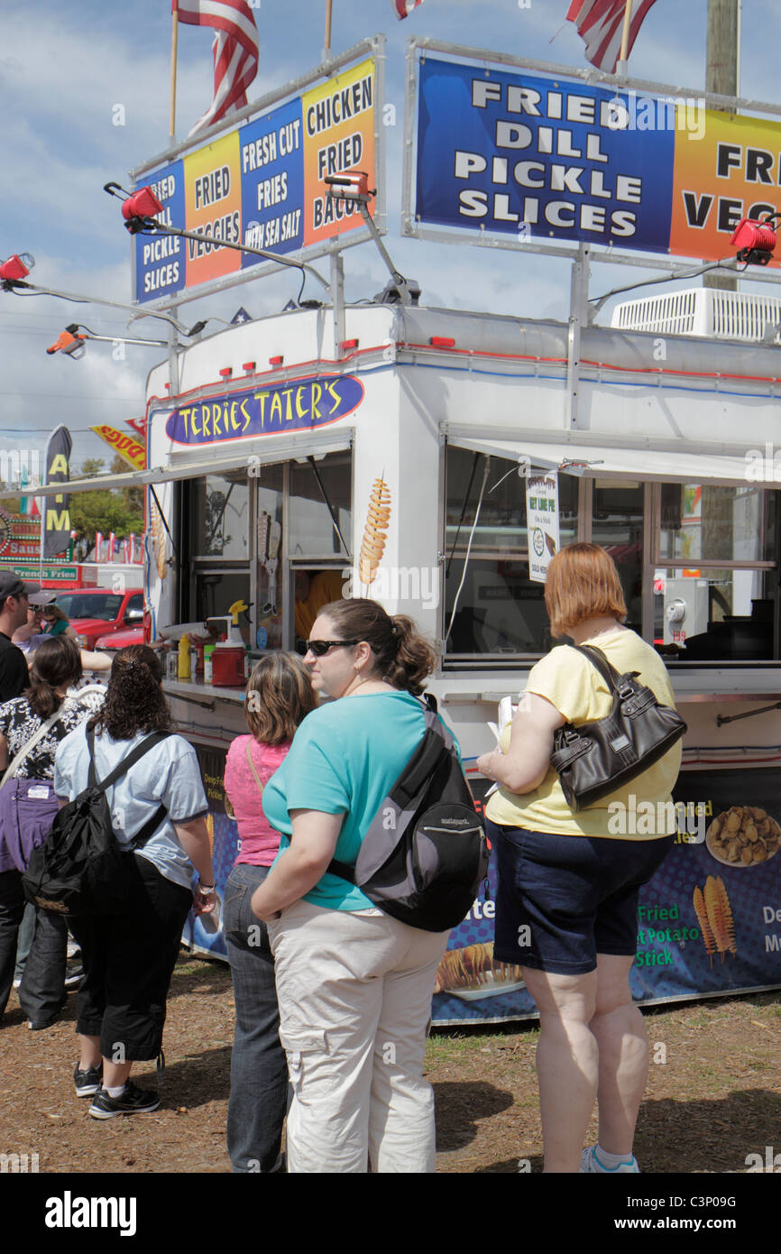 Florida,Hillsborough County,Plant City,Florida Strawberry Festival,carnival,food,overweight obese obesity fat heavy plump rotund stout,woman female wo Stock Photo