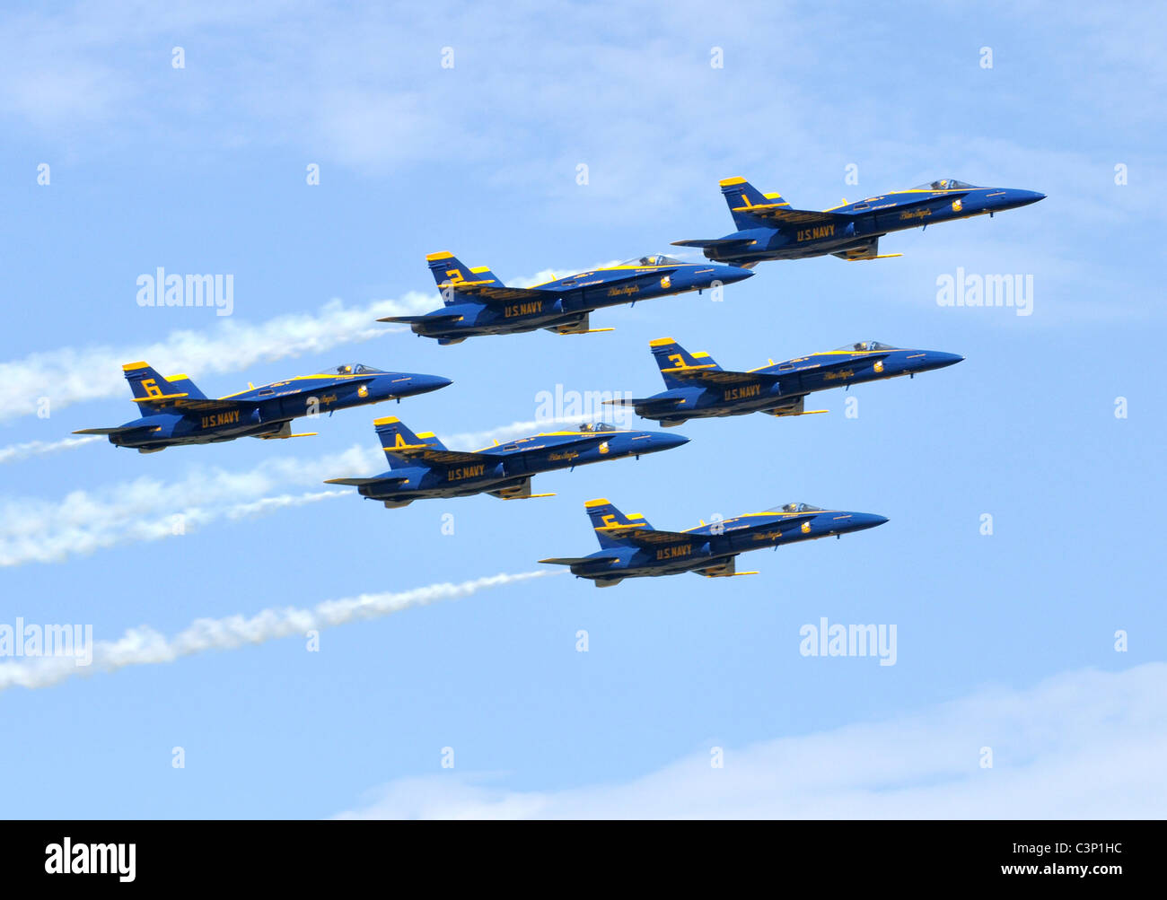 The U.S. Navy flight demonstration squadron, the Blue Angels, fly in formation above New Orleans, LA. Stock Photo