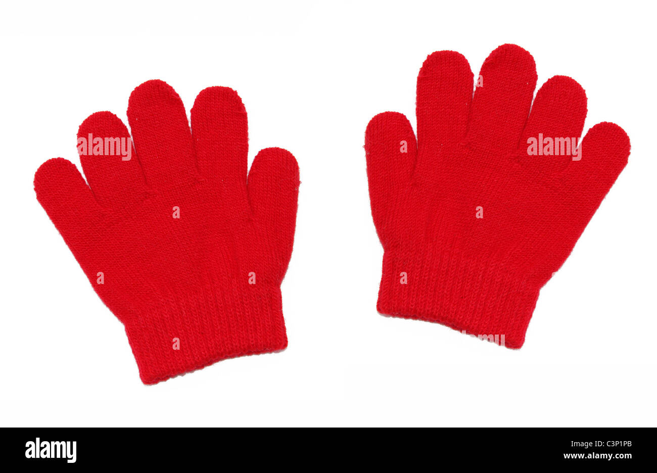 Children's red gloves on white background Stock Photo Alamy