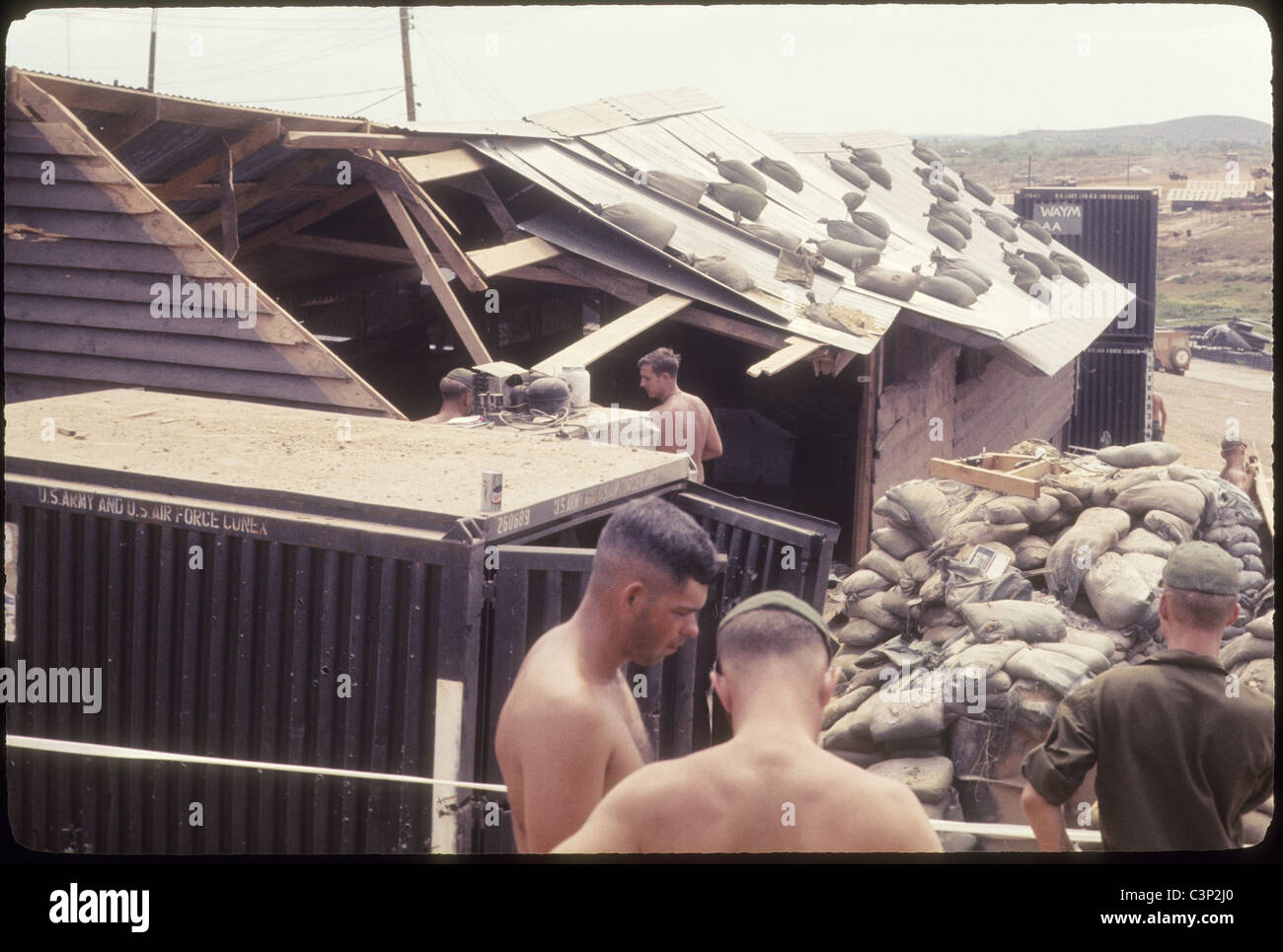 a shau valley 101st Airborne 1969 hooch after rocket hit and wounds 20 GIs americans sandbagged roof Stock Photo