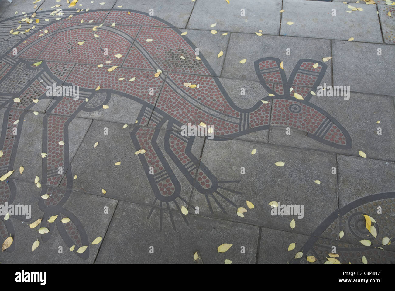 A Kangaroo depicted in Aboriginal style on a street pavement in Adelaide Australia Stock Photo