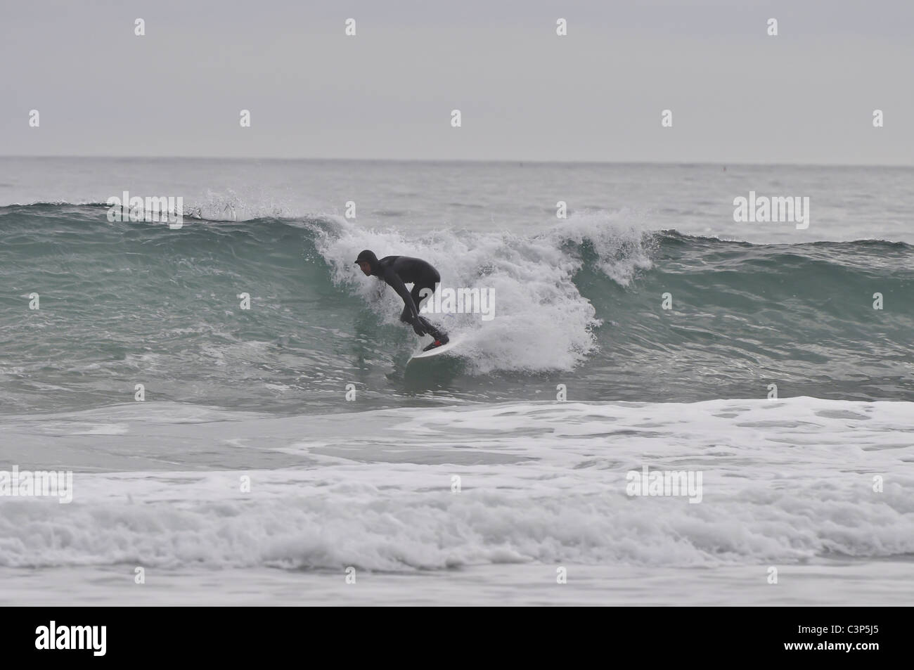 Surfing at Porth Ceiriad Abersoch on the Lleyn Peninsula Stock Photo