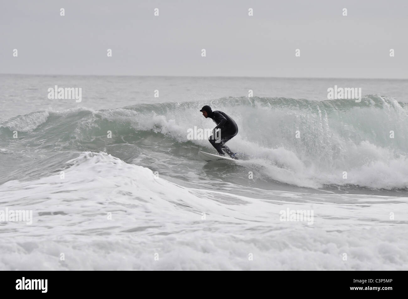 Surfing at Porth Ceiriad Abersoch on the Lleyn Peninsula Stock Photo