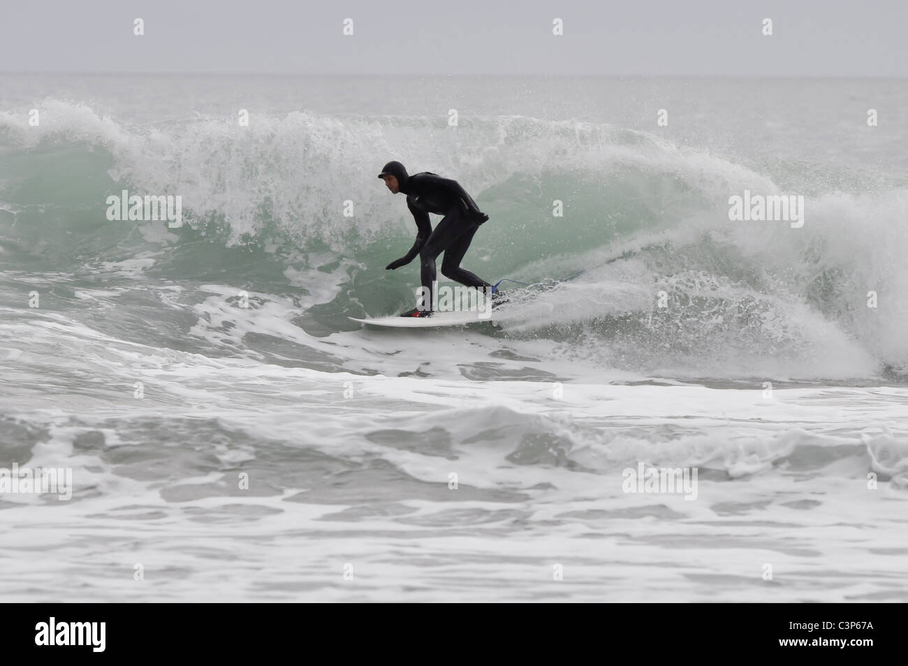 Surfing at Porth Ceiriad Abersoch on the Lleyn Peninsula Stock Photo