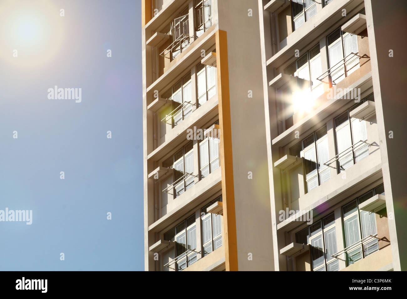 new apartments building and blue sky as a background Stock Photo - Alamy