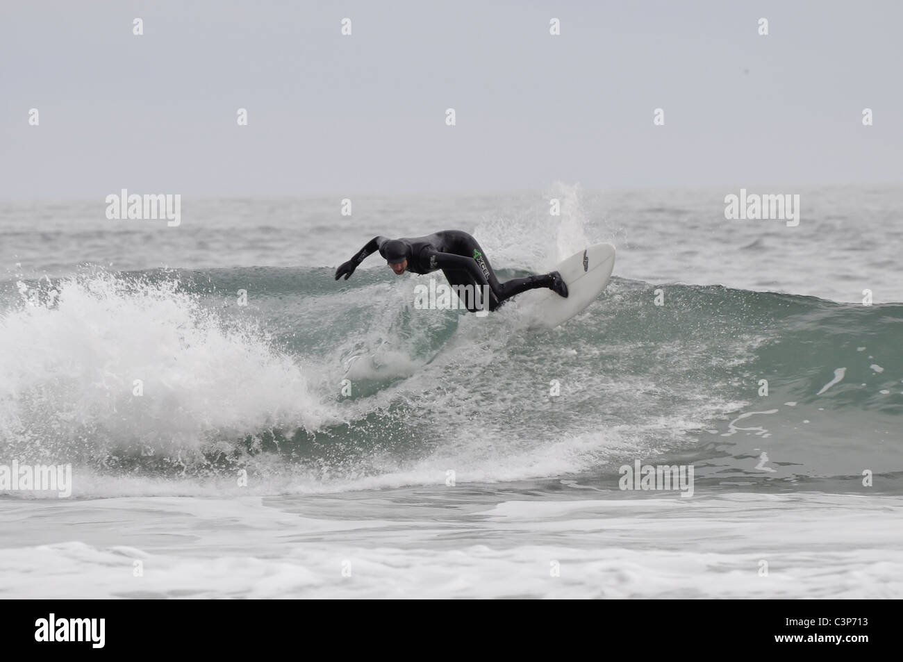 Surfing at Porth Ceiriad Abersoch on the Lleyn Peninsula Stock Photo