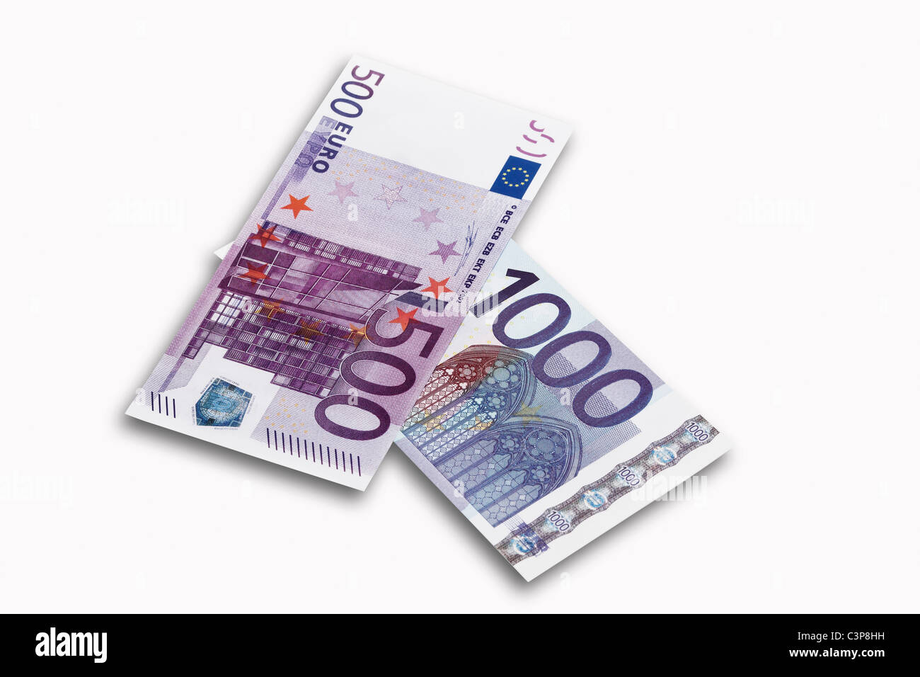 500 and 1000 Euro notes on white background, close-up Stock Photo
