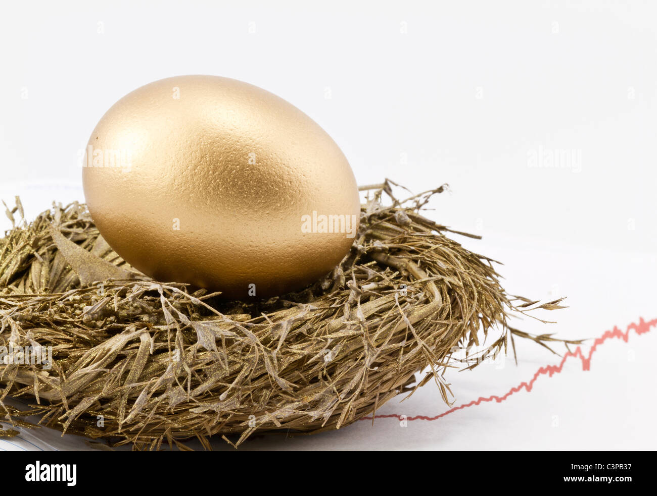Gold nest egg sits in gold nest with rising chart of returns in background and copy space on